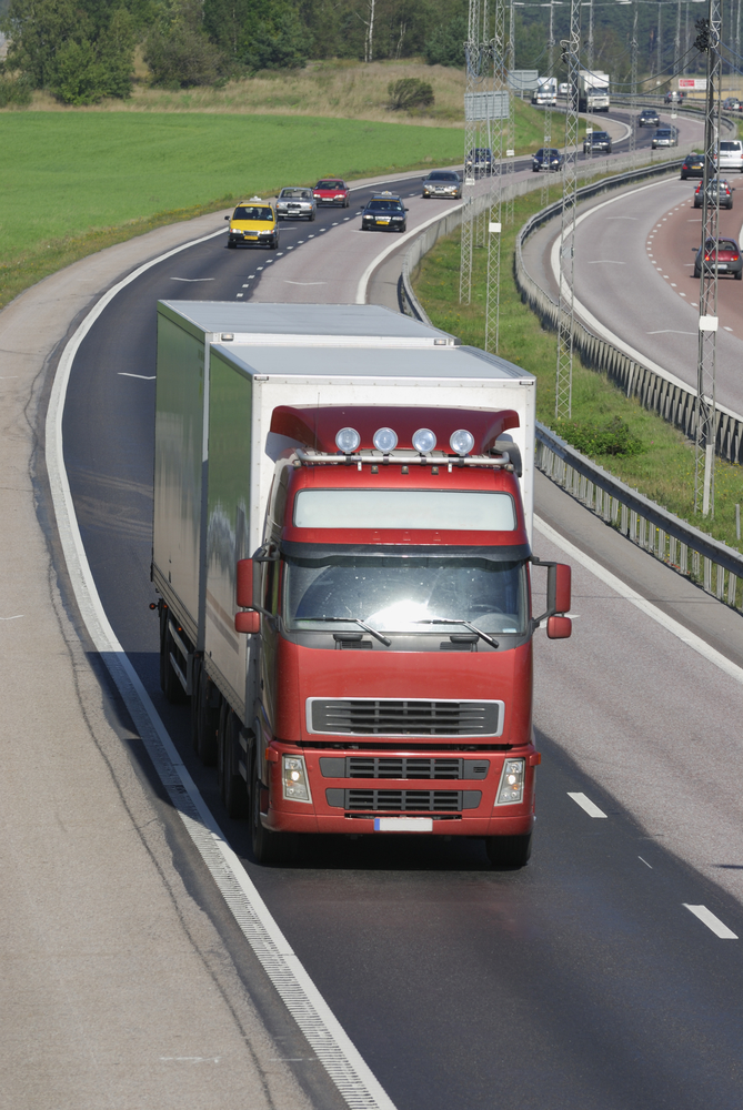red and white hgv trailer